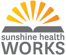 Sunshine Health Works logo, sun rising over an open book