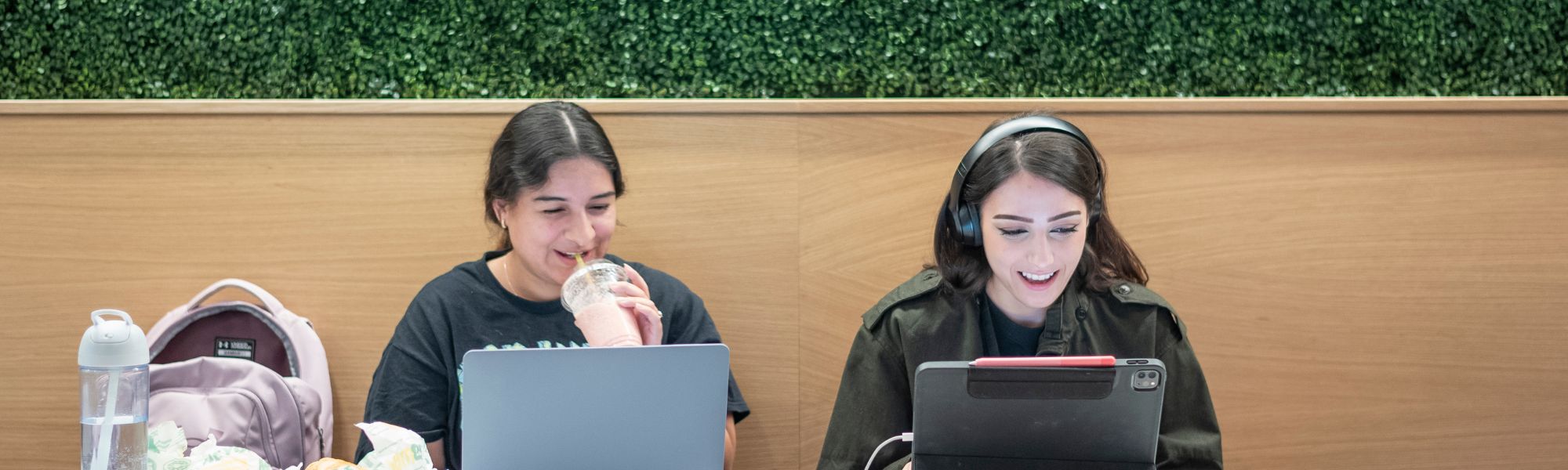 Two students studying in the student union.