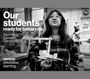 Verizon STEM middle school program student with robots and other gadgets. 