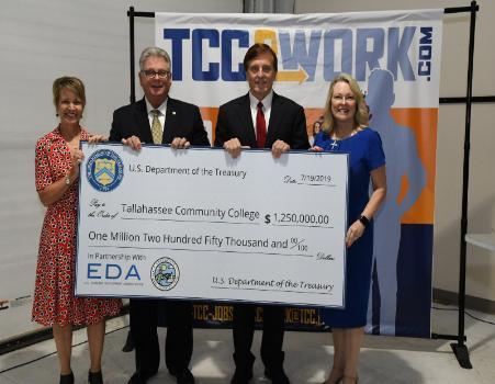 Dr. Fleming with TCC Officials and grant check